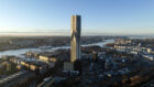 Aerial view of Karlatornet, a 74 storey twisted tall building, pictured in the wider low-rise context of Gothenburg, Sweden